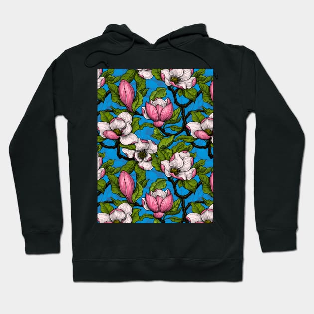 Blooming magnolia on blue Hoodie by katerinamk